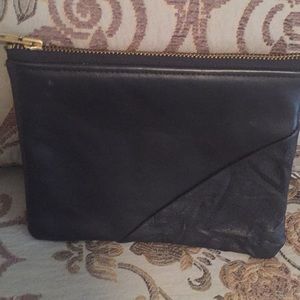 Black leather pouch by designer Melissa Fleis.